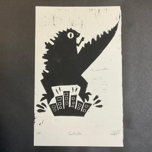 A linoblock print of a silhouetted creature.