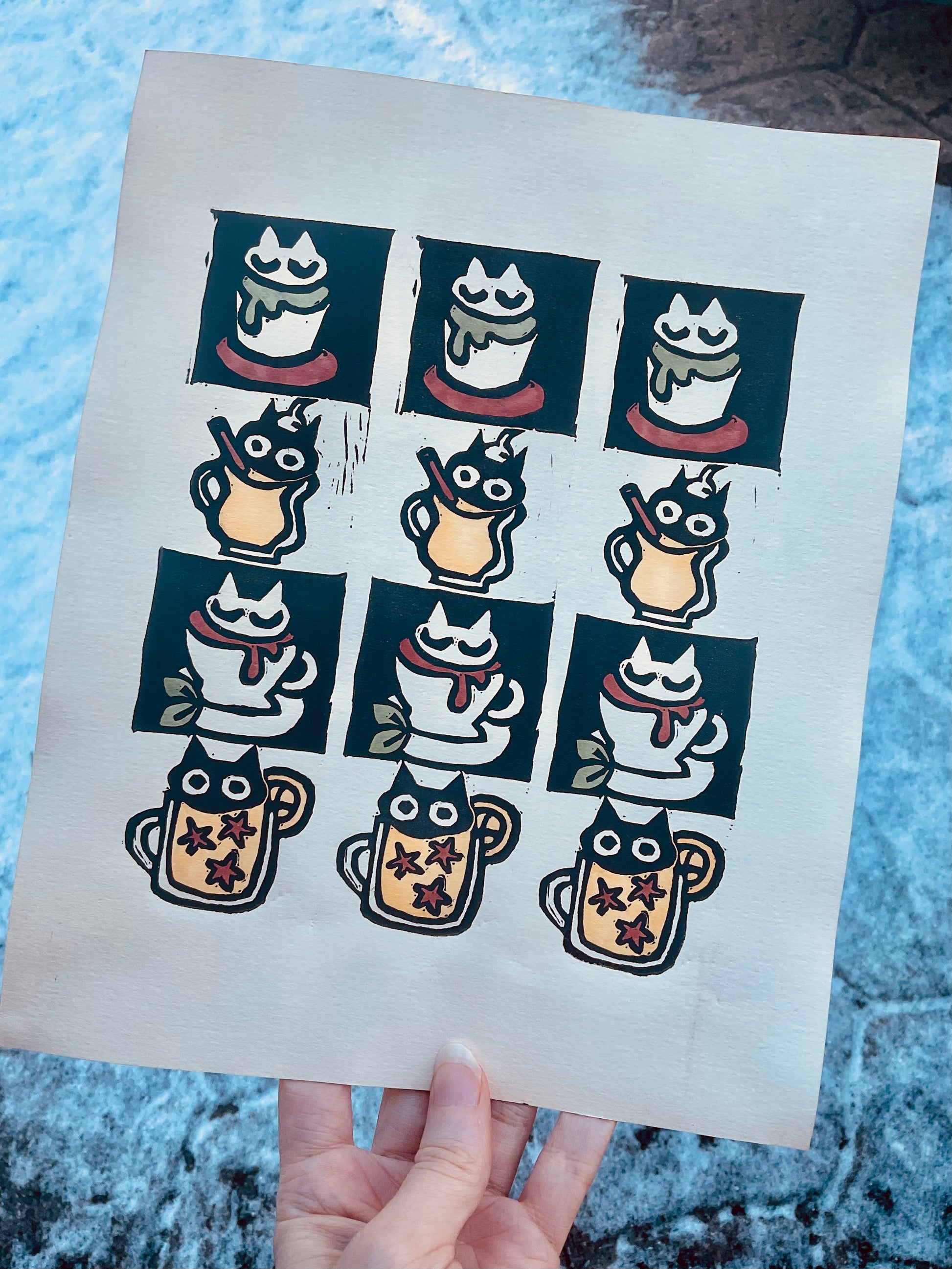 Rows of cute cats in holiday drinks.